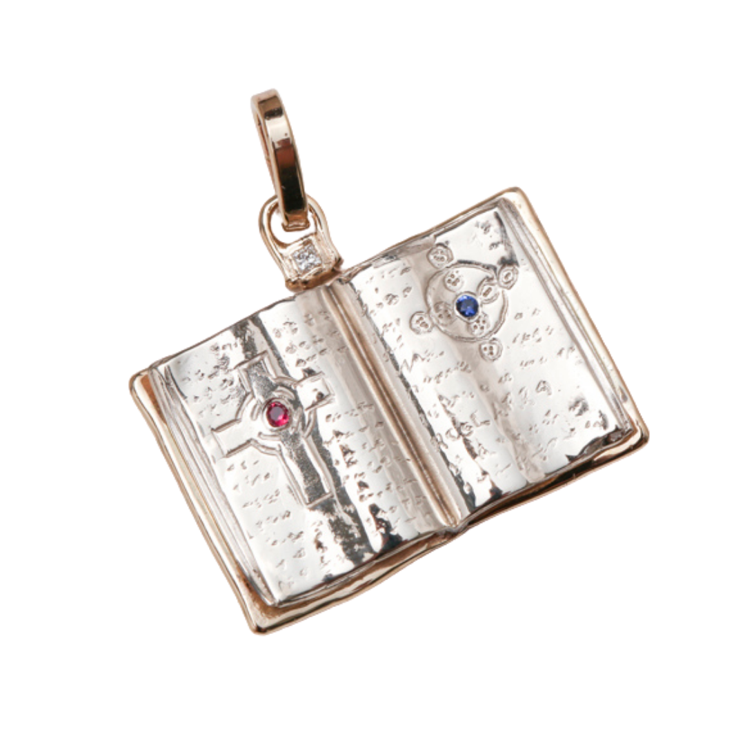 Temple of Man Esoteric Jewellery  Akashic Records pendant is a gold book with ancient symbols, a ruby on the left and a sapphire on the right, with a diamond above.